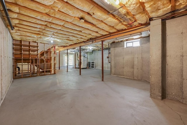 below grade area featuring heating unit