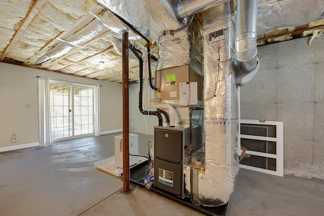 utility room with heating unit