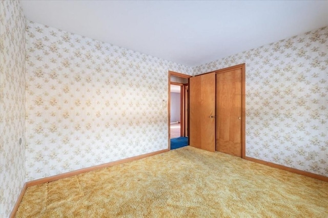 spare room featuring carpet