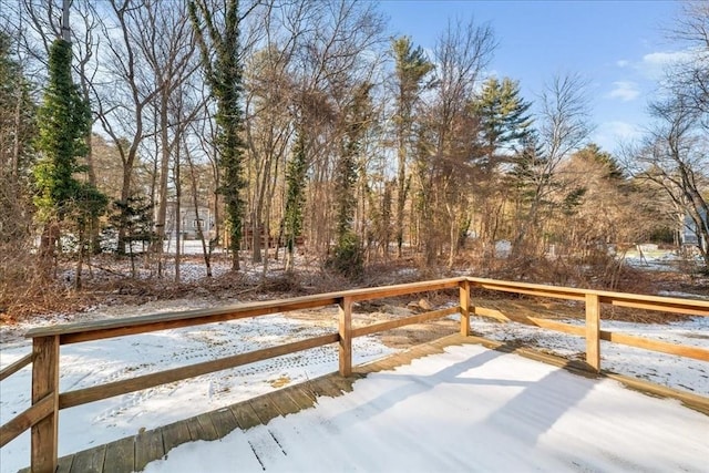 view of snow covered deck