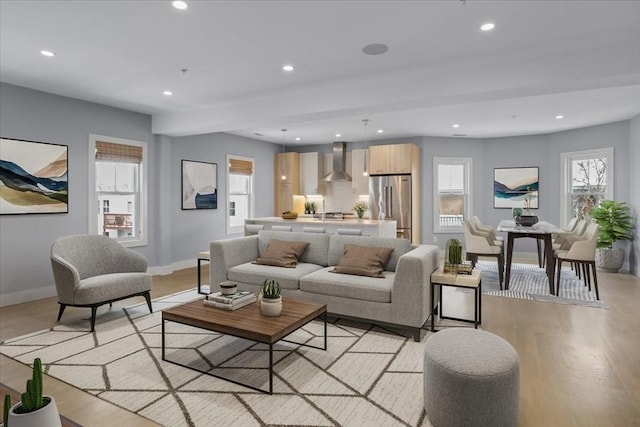 living room with light hardwood / wood-style flooring