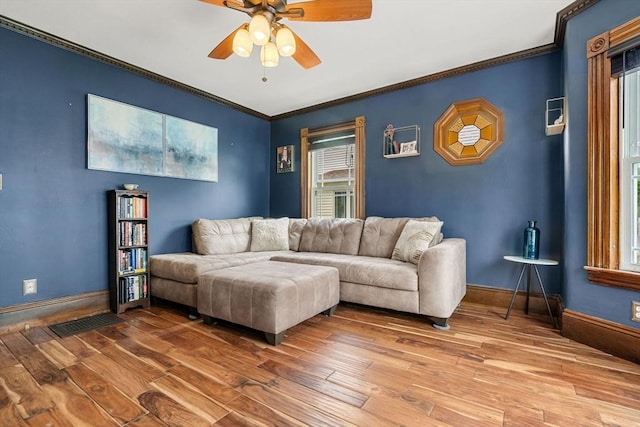 19 Brown Ct, Methuen, MA 01844 - living room with ceiling fan, wood-type flooring, baseboards, and crown molding