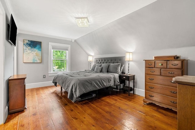 19 Brown Ct, Methuen, MA 01844 - bedroom with light wood-style floors, baseboards, and vaulted ceiling
