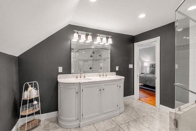19 Brown Ct, Methuen, MA 01844 - bathroom featuring a stall shower, vaulted ceiling, ensuite bath, double vanity, and marble look tiles