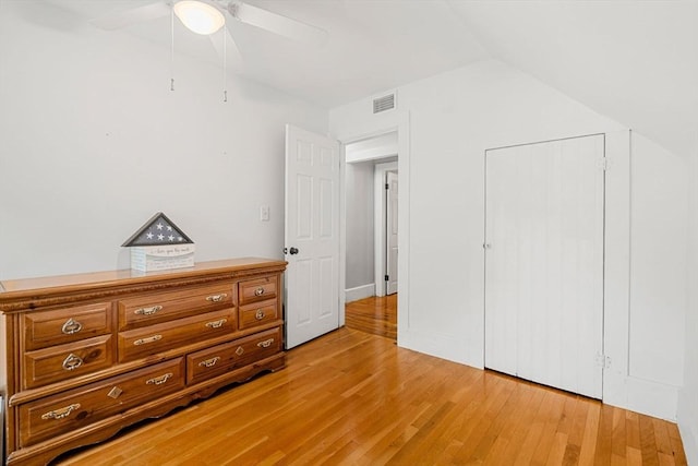 19 Brown Ct, Methuen, MA 01844 - bedroom featuring light wood finished floors, vaulted ceiling, and a ceiling fan