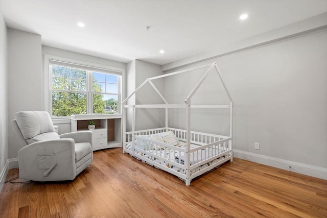 114 Broad St Unit D, Weymouth, MA 02188 - bedroom with baseboards, wood finished floors, and recessed lighting