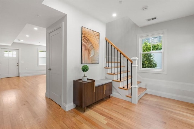 114 Broad St Unit D, Weymouth, MA 02188 - staircase with wood finished floors, recessed lighting, and baseboards