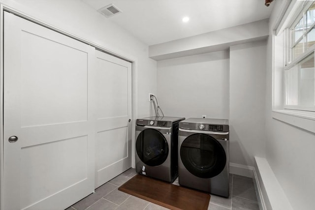114 Broad St Unit D, Weymouth, MA 02188 - laundry room with washer and clothes dryer, light tile patterned flooring, and recessed lighting