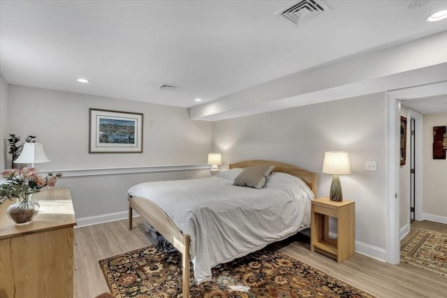 bedroom featuring light wood-type flooring