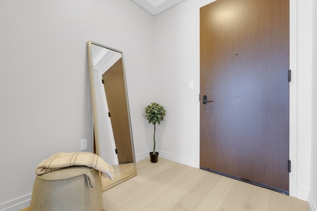 entryway with light hardwood / wood-style flooring