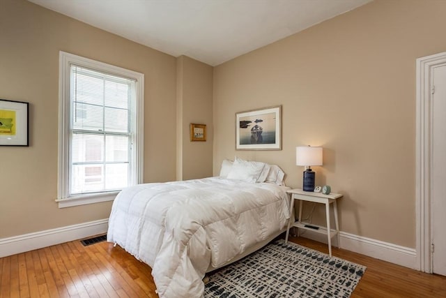 36 7th St, New Bedford, MA 02740 - bedroom with baseboards and wood-type flooring