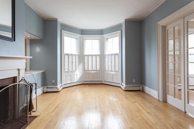 36 7th St, New Bedford, MA 02740 - unfurnished living room with a fireplace with flush hearth, hardwood / wood-style floors, baseboards, and crown molding