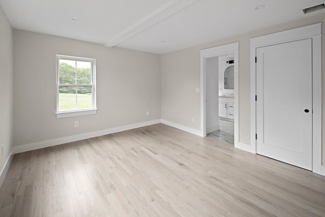 19 Couture Way, Middleton, MA 01949 - unfurnished bedroom with light wood finished floors and connected bathroom