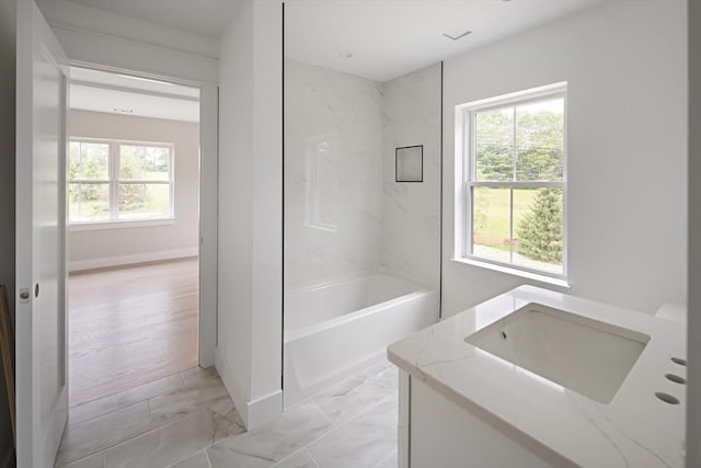 19 Couture Way, Middleton, MA 01949 - bathroom featuring vanity, tub / shower combination, and marble finish flooring