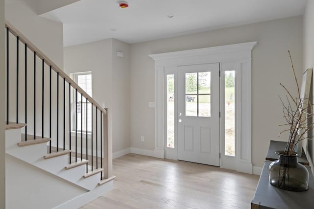 19 Couture Way, Middleton, MA 01949 - entrance foyer featuring plenty of natural light, wood finished floors, and stairway