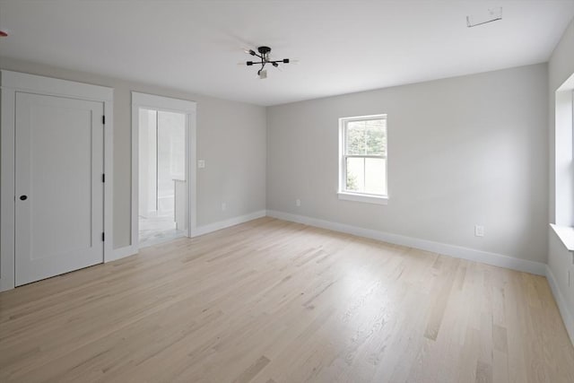 19 Couture Way, Middleton, MA 01949 - spare room with light wood-style floors and baseboards