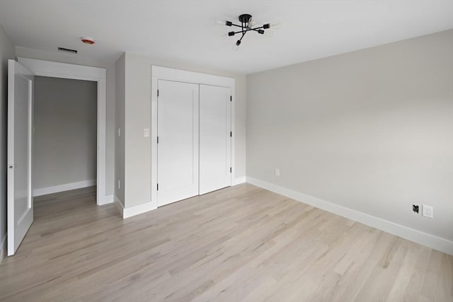 19 Couture Way, Middleton, MA 01949 - unfurnished bedroom featuring light wood finished floors and a closet