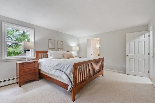 24 Squirrel Hill Rd, Acton, MA 01720 - bedroom featuring baseboard heating and light colored carpet