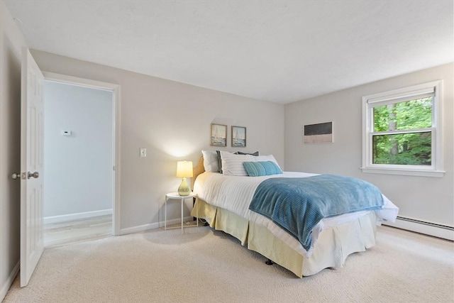 24 Squirrel Hill Rd, Acton, MA 01720 - bedroom featuring light carpet and baseboard heating