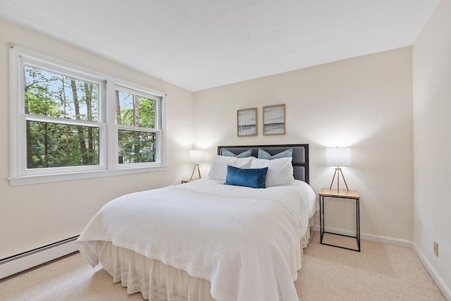 24 Squirrel Hill Rd, Acton, MA 01720 - bedroom with a baseboard heating unit and carpet flooring