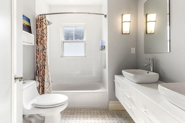 95-97 Charlesbank Rd Unit 2, Newton, MA 02458 - bathroom with double vanity and shower / tub combo with curtain