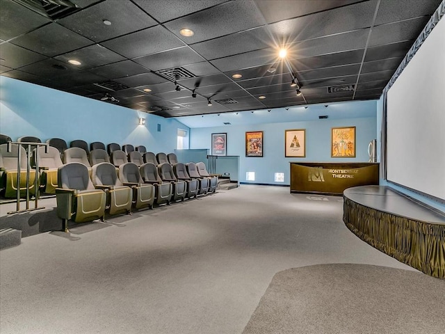 carpeted cinema room with track lighting