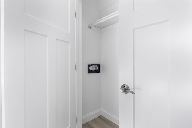 112 W Main Unit 5, Barnstable, MA 02601 - laundry area featuring light wood-type flooring and hookup for an electric dryer