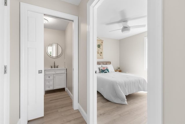 112 W Main Unit 5, Barnstable, MA 02601 - bedroom with light wood-type flooring and a ceiling fan