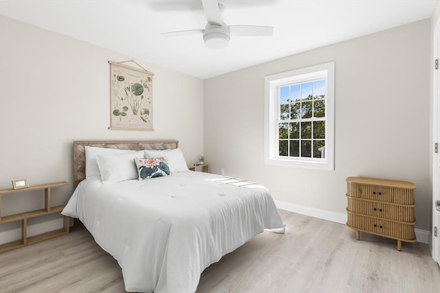 112 W Main Unit 5, Barnstable, MA 02601 - bedroom featuring light wood-style flooring and a ceiling fan
