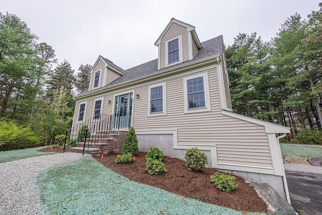view of new england style home
