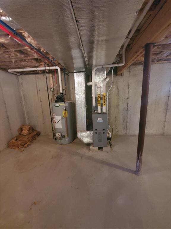 basement with gas water heater and heating unit