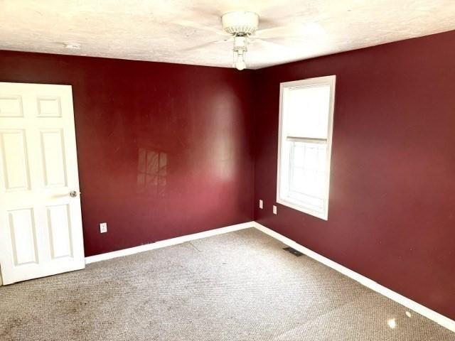 62 Moreland Green Dr, Worcester, MA 01609 - carpeted spare room featuring ceiling fan and baseboards
