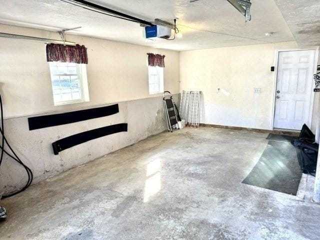 62 Moreland Green Dr, Worcester, MA 01609 - garage featuring a garage door opener