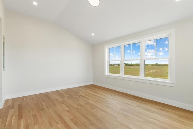 77 N End Blvd Unit 2, Salisbury, MA 01952 - unfurnished room featuring baseboards, light wood-type flooring, vaulted ceiling, and recessed lighting