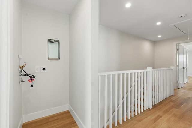 77 N End Blvd Unit 2, Salisbury, MA 01952 - hall featuring attic access, wood finished floors, baseboards, recessed lighting, and an upstairs landing