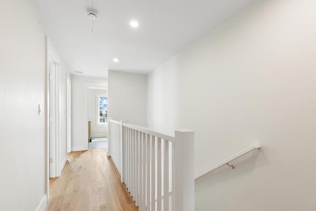 77 N End Blvd Unit 2, Salisbury, MA 01952 - corridor with an upstairs landing, light wood-style floors, recessed lighting, and baseboards