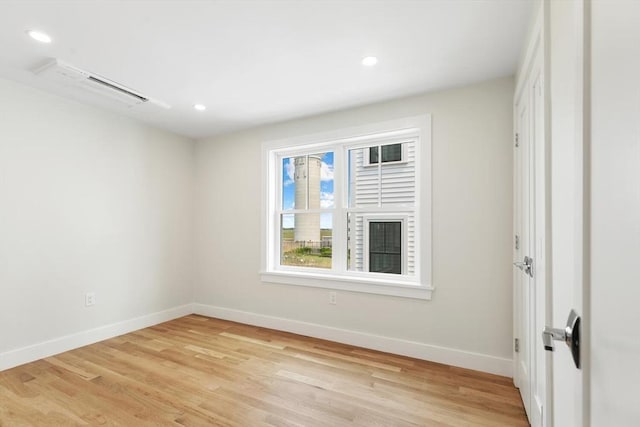 77 N End Blvd Unit 2, Salisbury, MA 01952 - empty room featuring baseboards, light wood-style flooring, and recessed lighting