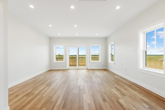 77 N End Blvd Unit 2, Salisbury, MA 01952 - unfurnished room with baseboards, light wood-style flooring, and recessed lighting