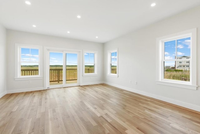 77 N End Blvd Unit 2, Salisbury, MA 01952 - empty room with baseboards, light wood finished floors, and recessed lighting