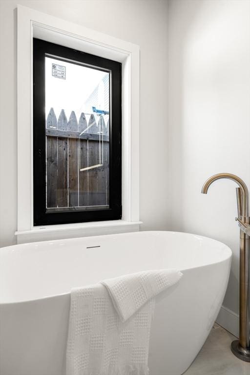 832 E 3rd Unit A, Boston, MA 02127 - detailed view of a freestanding tub and baseboards