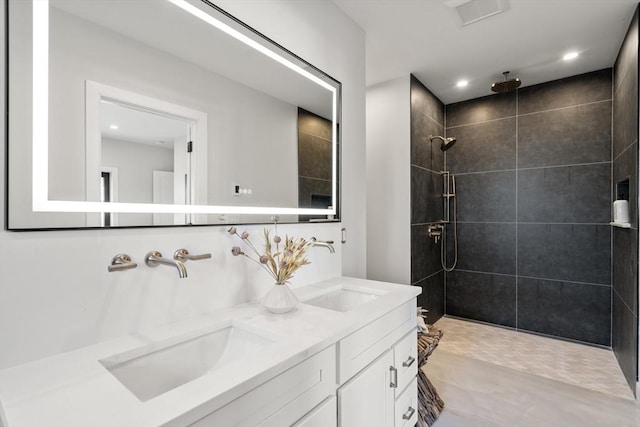 832 E 3rd Unit A, Boston, MA 02127 - full bath featuring double vanity, a tile shower, and recessed lighting