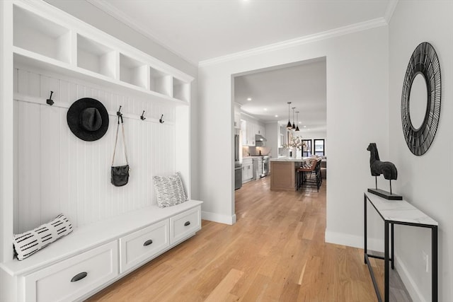 832 E 3rd Unit A, Boston, MA 02127 - mudroom with light wood-style floors, ornamental molding, and recessed lighting