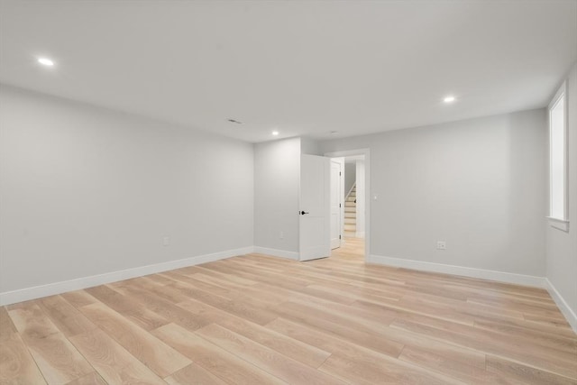 832 E 3rd Unit A, Boston, MA 02127 - unfurnished room featuring light wood-style flooring, stairs, and recessed lighting