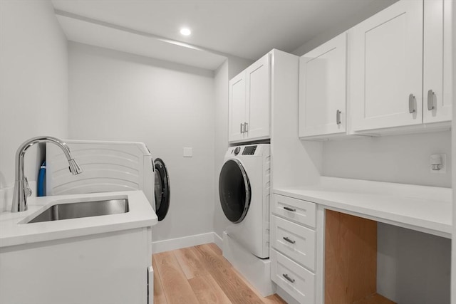 832 E 3rd Unit A, Boston, MA 02127 - washroom with cabinet space, light wood-type flooring, and recessed lighting