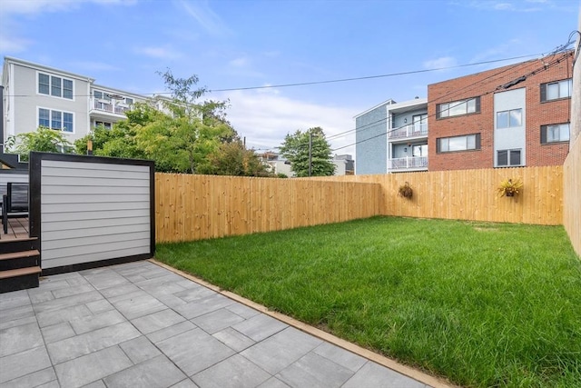 832 E 3rd Unit A, Boston, MA 02127 - fenced backyard featuring a patio