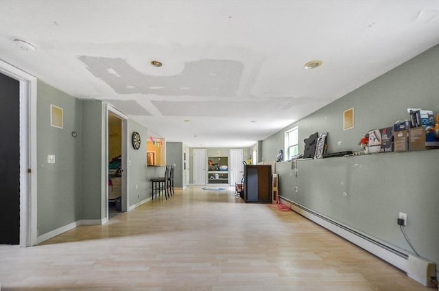 249 Chace Rd, Freetown, MA 02717 - corridor with a baseboard heating unit and light wood-type flooring
