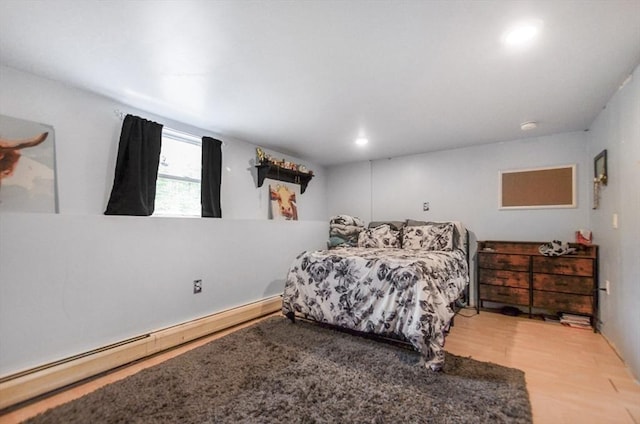 249 Chace Rd, Freetown, MA 02717 - bedroom featuring wood finished floors, recessed lighting, and baseboard heating