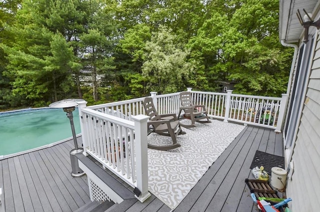 249 Chace Rd, Freetown, MA 02717 - deck with view of scattered trees and an outdoor pool