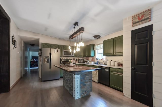 249 Chace Rd, Freetown, MA 02717 - kitchen with green cabinetry, appliances with stainless steel finishes, wood finished floors, and a kitchen island