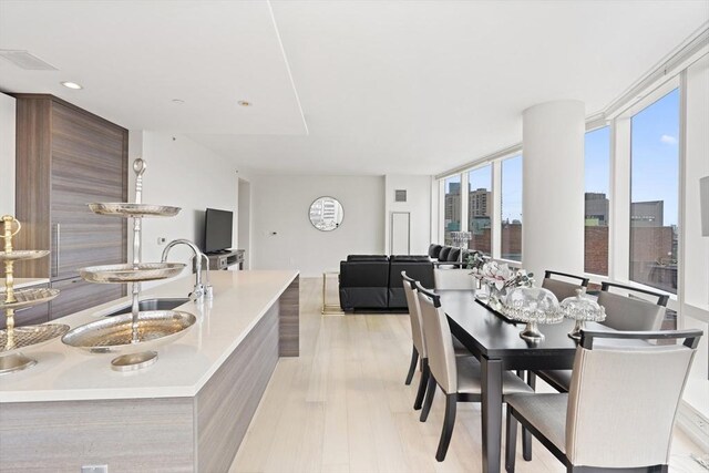 1 Franklin St Unit 1504, Boston, MA 02110 - dining space featuring light wood-type flooring and recessed lighting